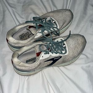 white and blue brooks